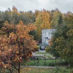 a house in the middle of a wooded area